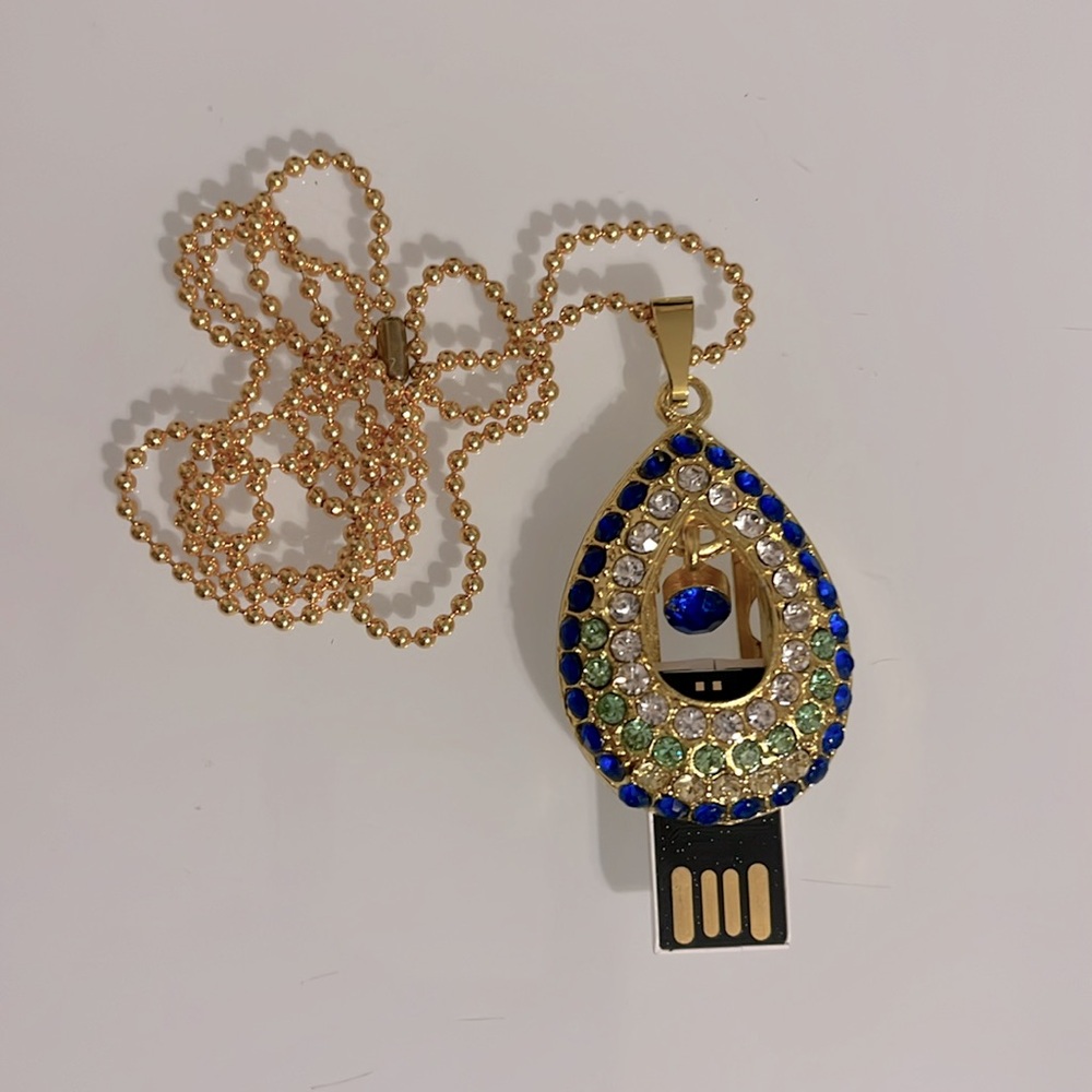 USB spy necklace with shiny crystals. Retractable thumb drive. Useful & pretty
